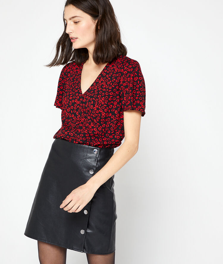 Blouse boutonnée imprimé fleuri noir.