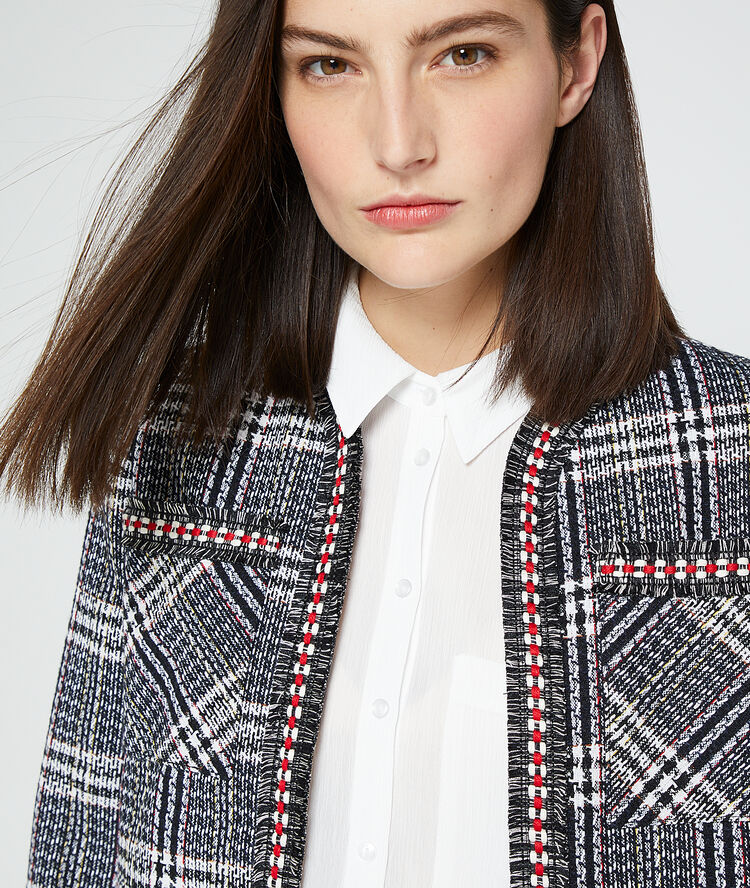 Veste de tailleur effet tweed noir.