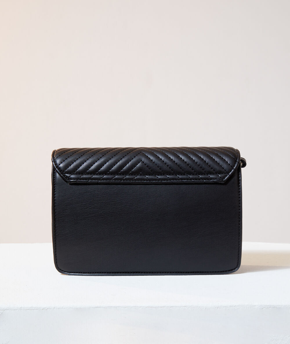 Sac besace matelassé noir.