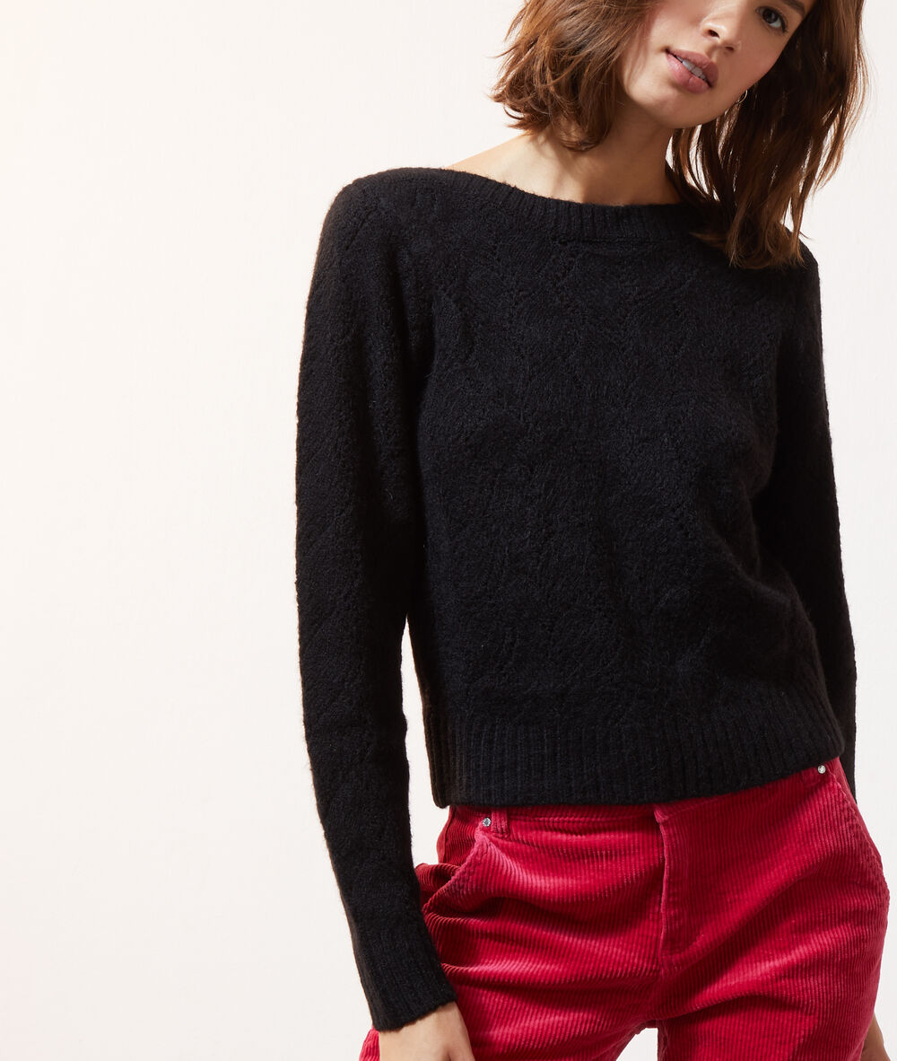 Pull en maille pointelle noir.