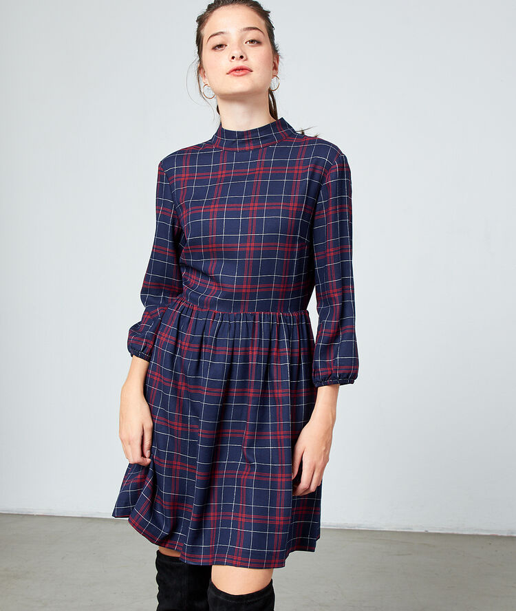 Robe dos noué à carreaux marine.