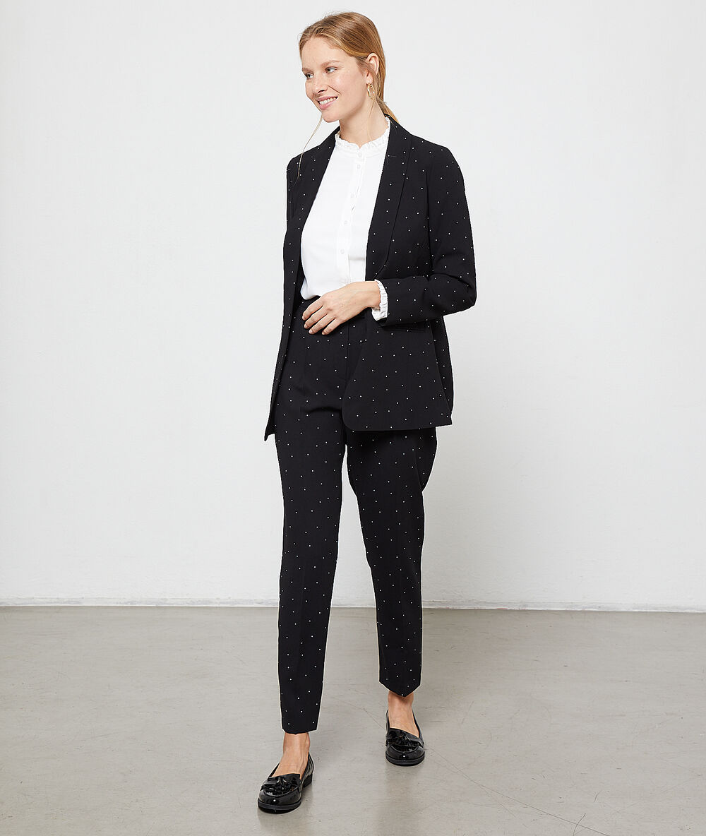Pantalon carotte à pois noir.