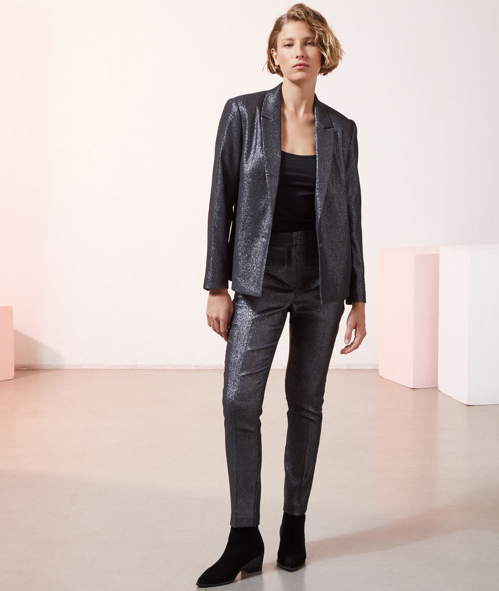 Veste de tailleur pailleté noir.