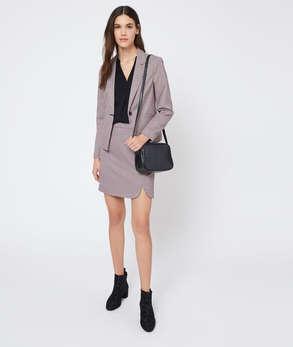 Veste de tailleur à motifs pied de poule marine.