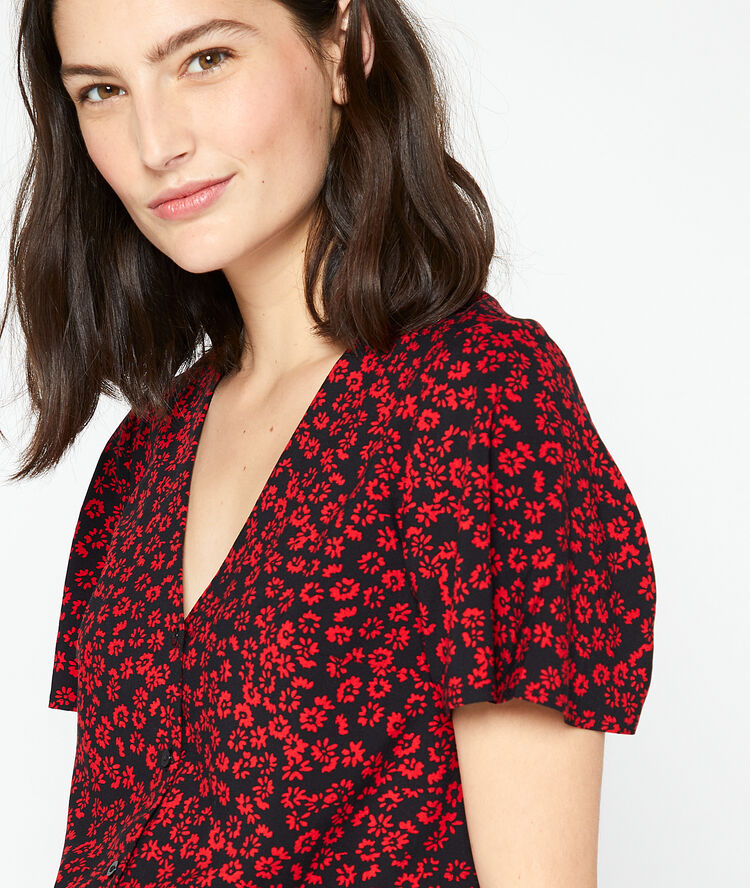 Blouse boutonnée imprimé fleuri noir.