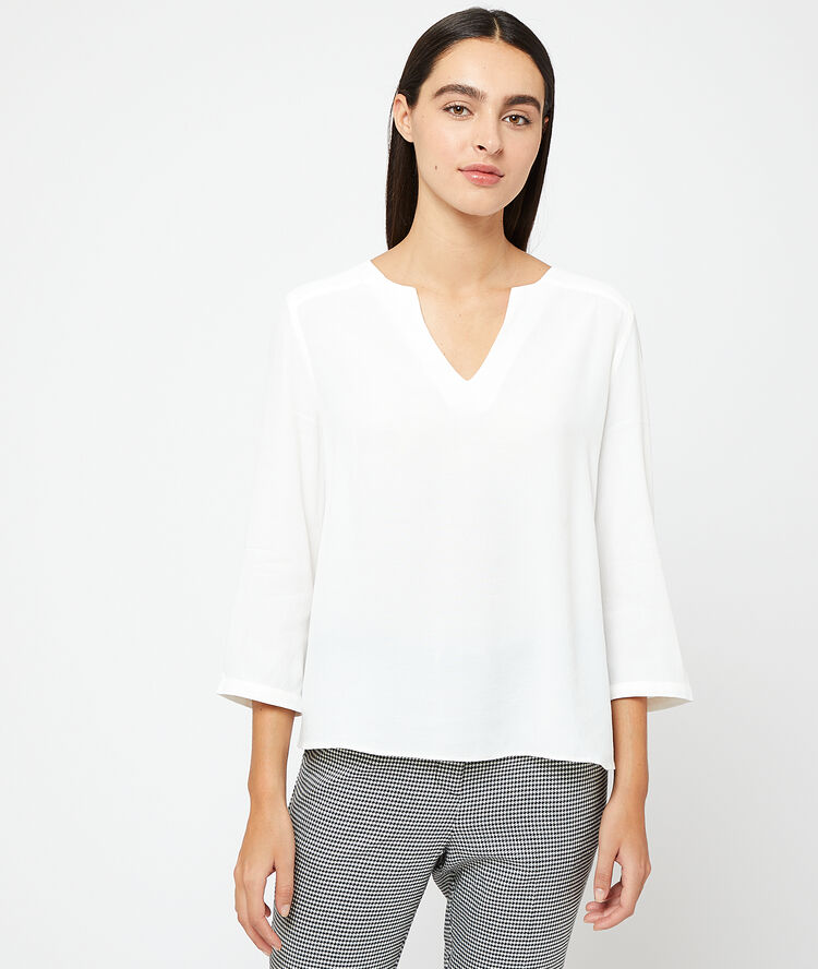 Blouse unie ecru.