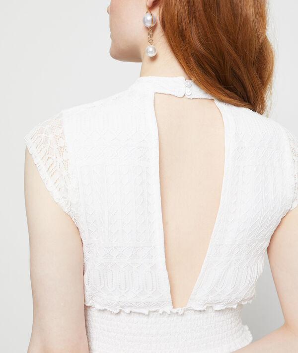 Robe dos ouvert en dentelle guipure ecru.