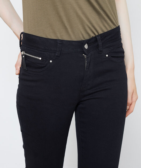 Pantalon slim noir.