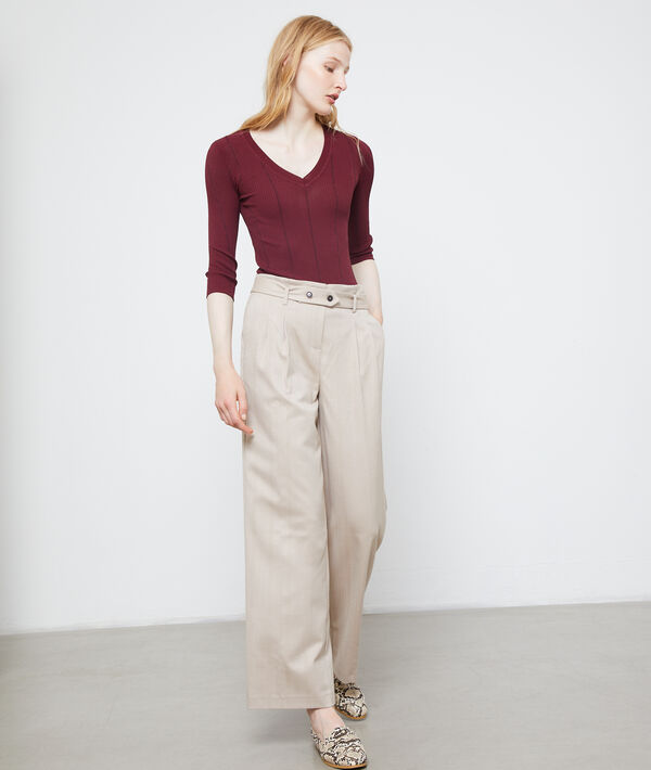 Pantalon large ceinturé creme.