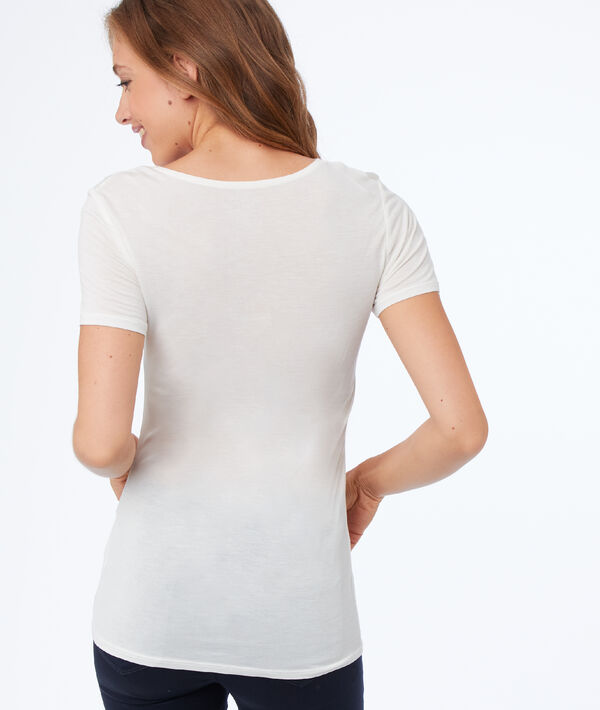T-shirt col v avec détails dentelle écru.