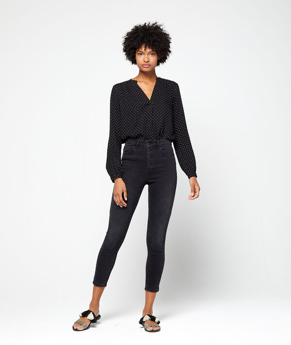 Blouse col tunisien à pois noir.