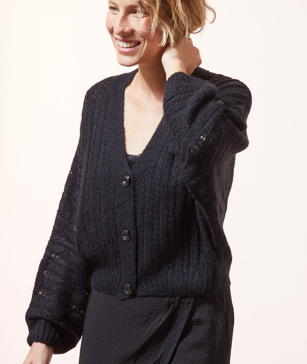 Gilet ample noir.