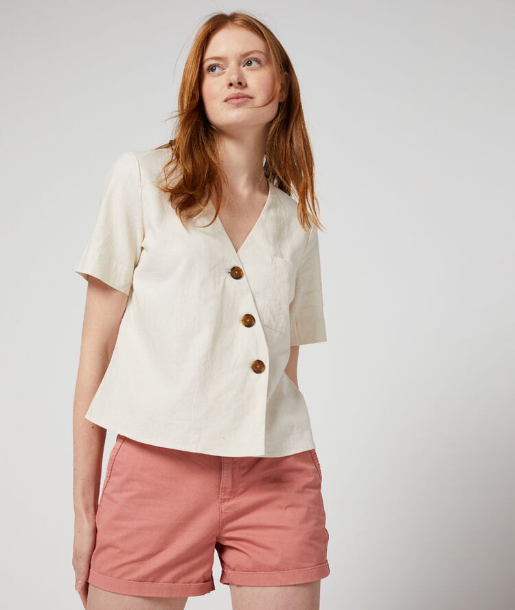 Blouse courte boutonnage asymétrique beige.