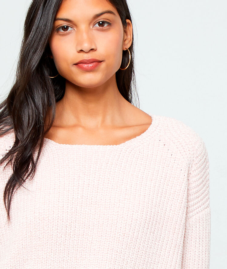 Pull en maille chenille rose pale.
