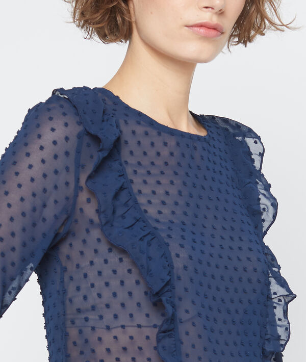 Blouse transparente en plumetis bleu d'encre.