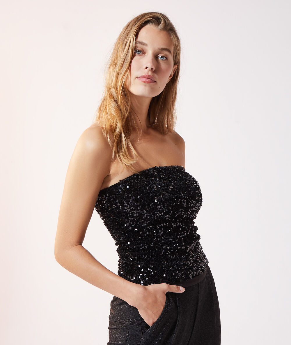 Bustier à sequins noir.