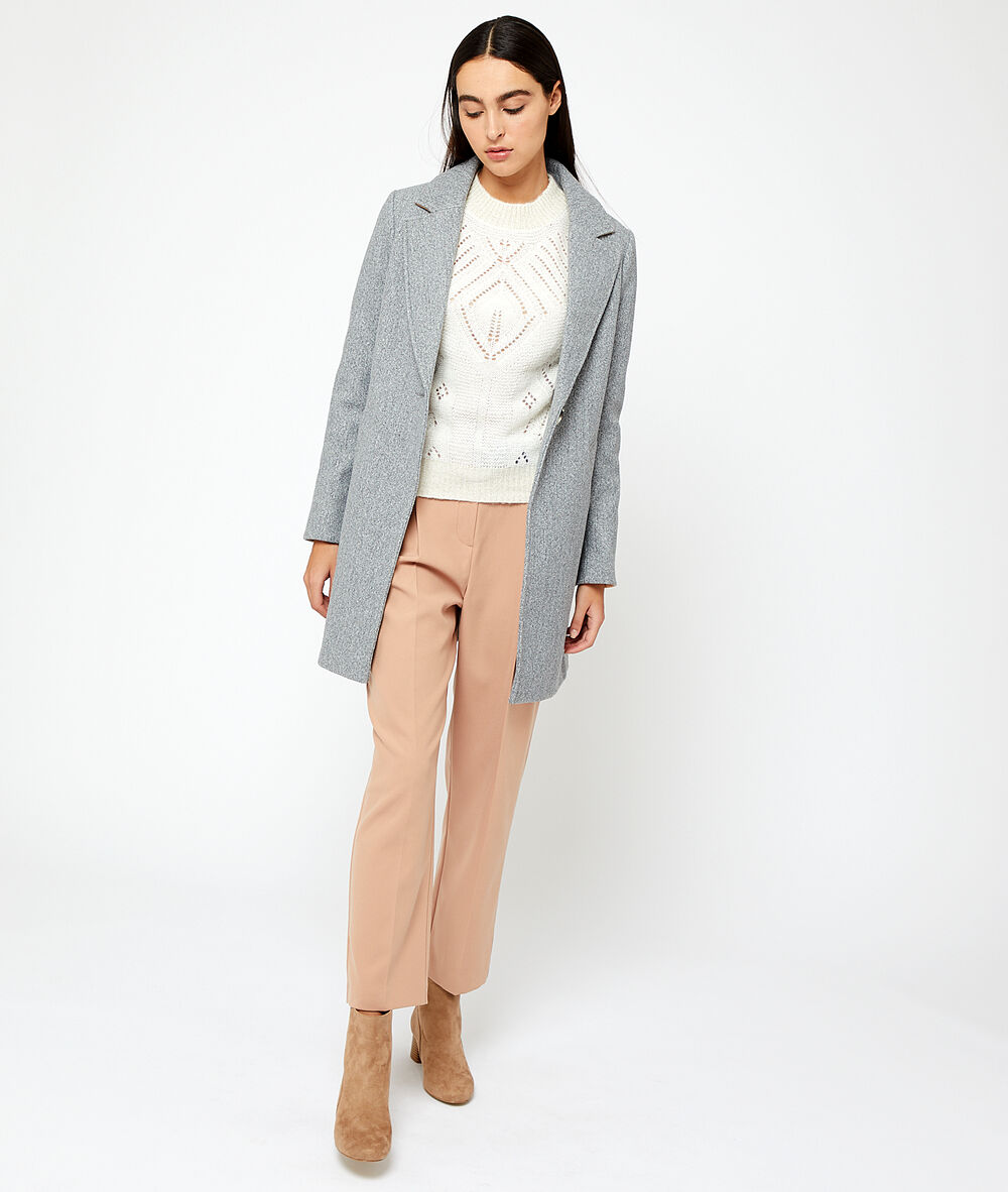 Pull en maille ajourée ecru.