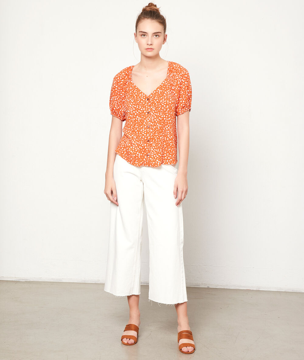 Top imprimé fleuri tangerine.