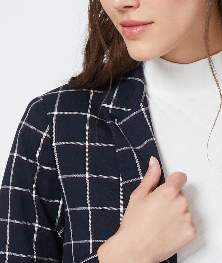 Veste de tailleur à carreaux marine.