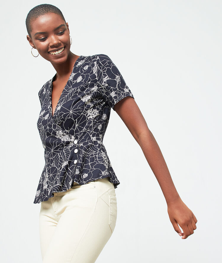 Blouse cache-coeur à imprimé fleuri noir.