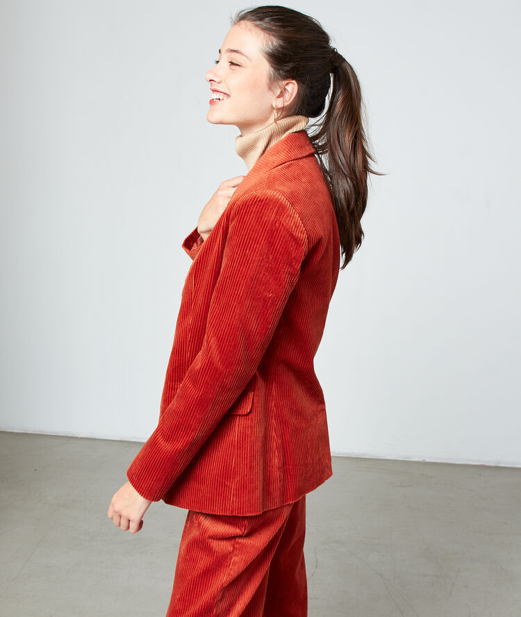 Veste de tailleur en velours côtelé rouille.