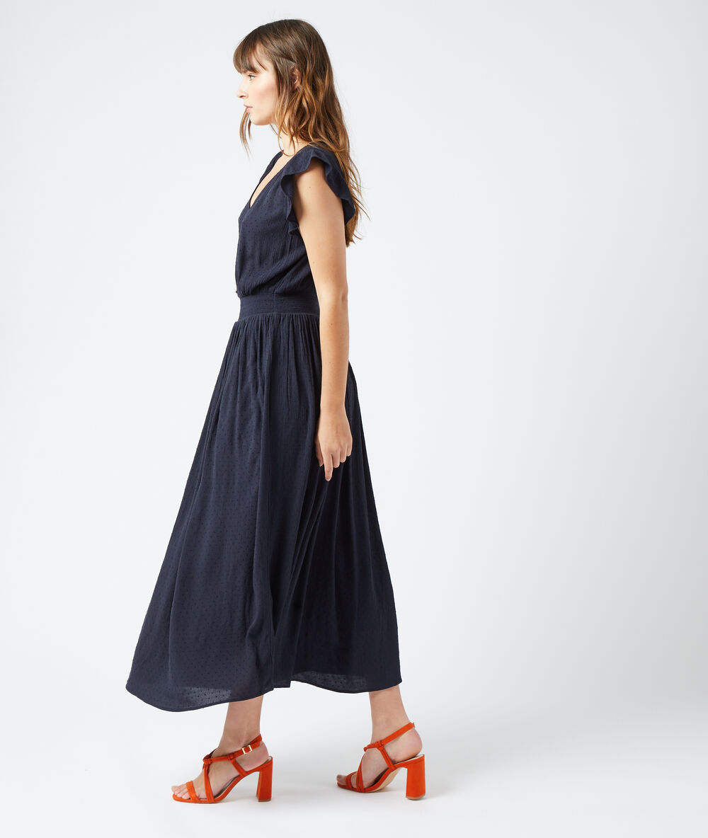 Robe longue en plumetis noir.