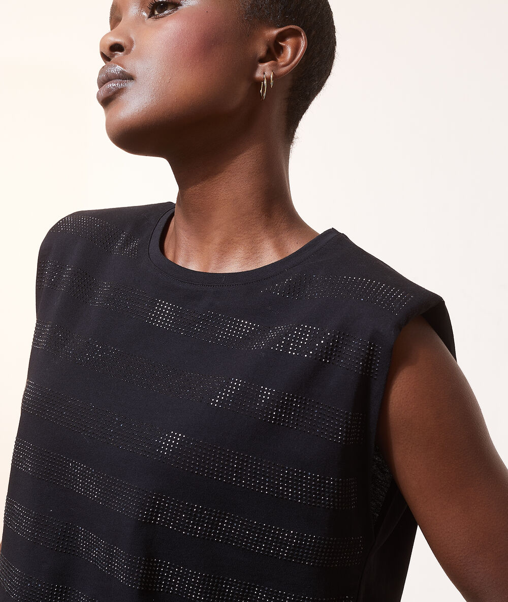 Top épaulettes avec strass noir.