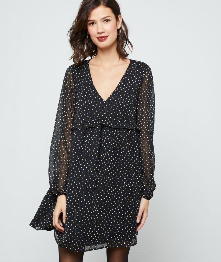 Robe doublée à pois noir.