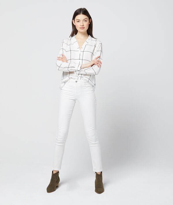 Chemise à carreaux ecru.