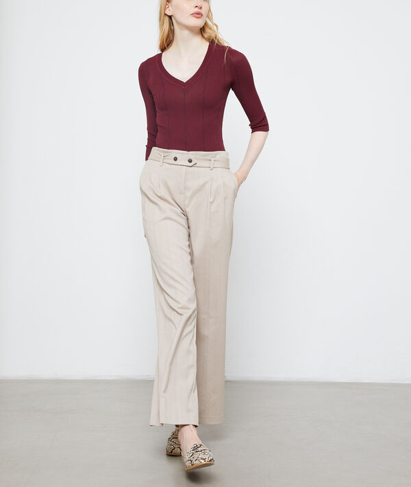 Pantalon large ceinturé creme.