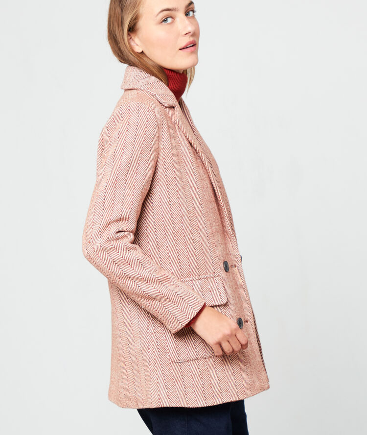 Veste de tailleur à chevrons rouille.