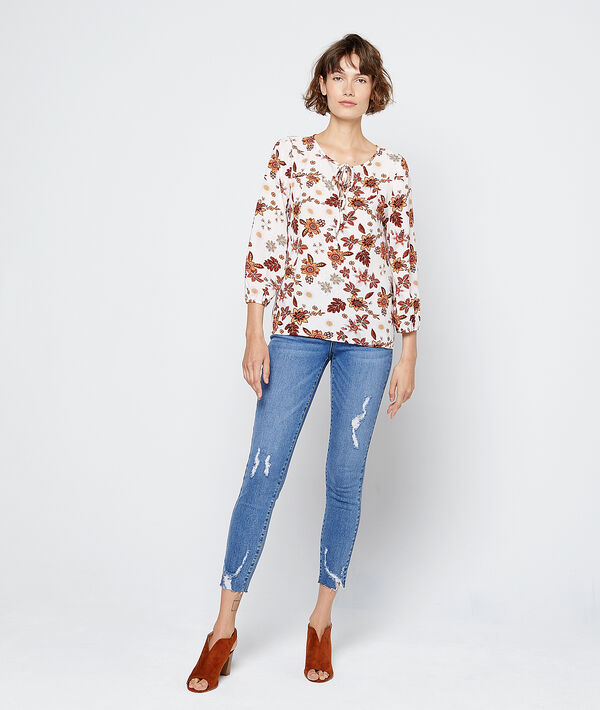 Blouse à imprimé floral ecru.