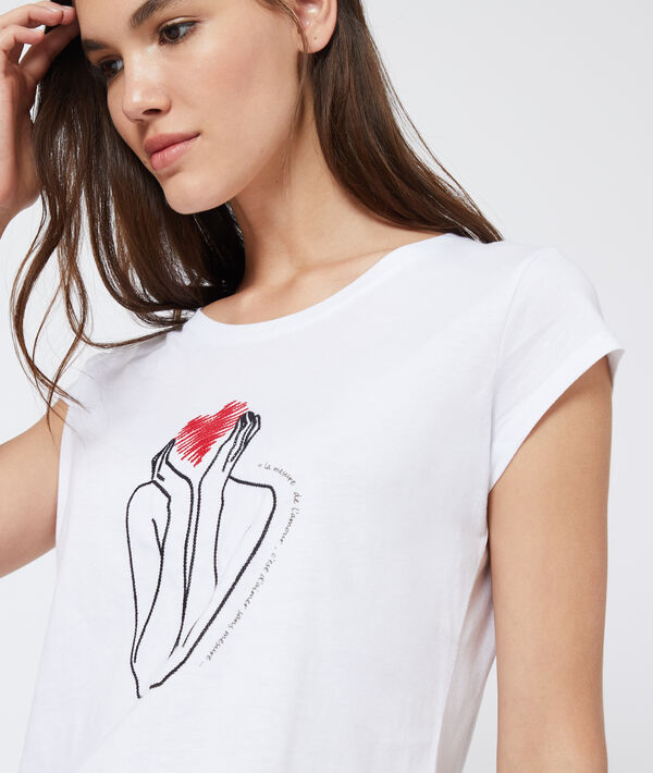 T-shirt à broderies ecru.