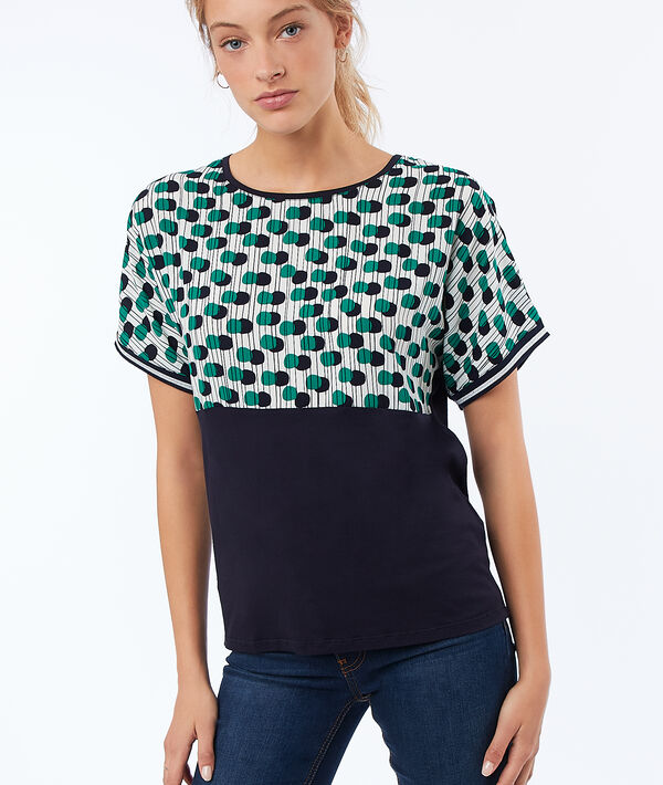 T-shirt à pois bleu marine.