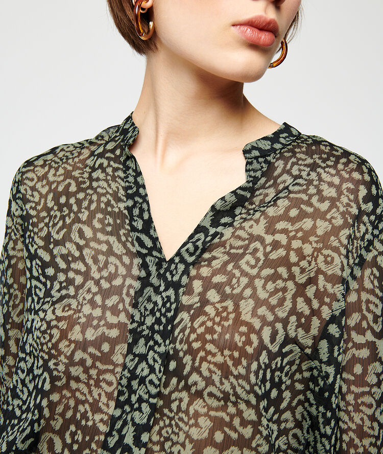 Blouse transparente imprimée noir.