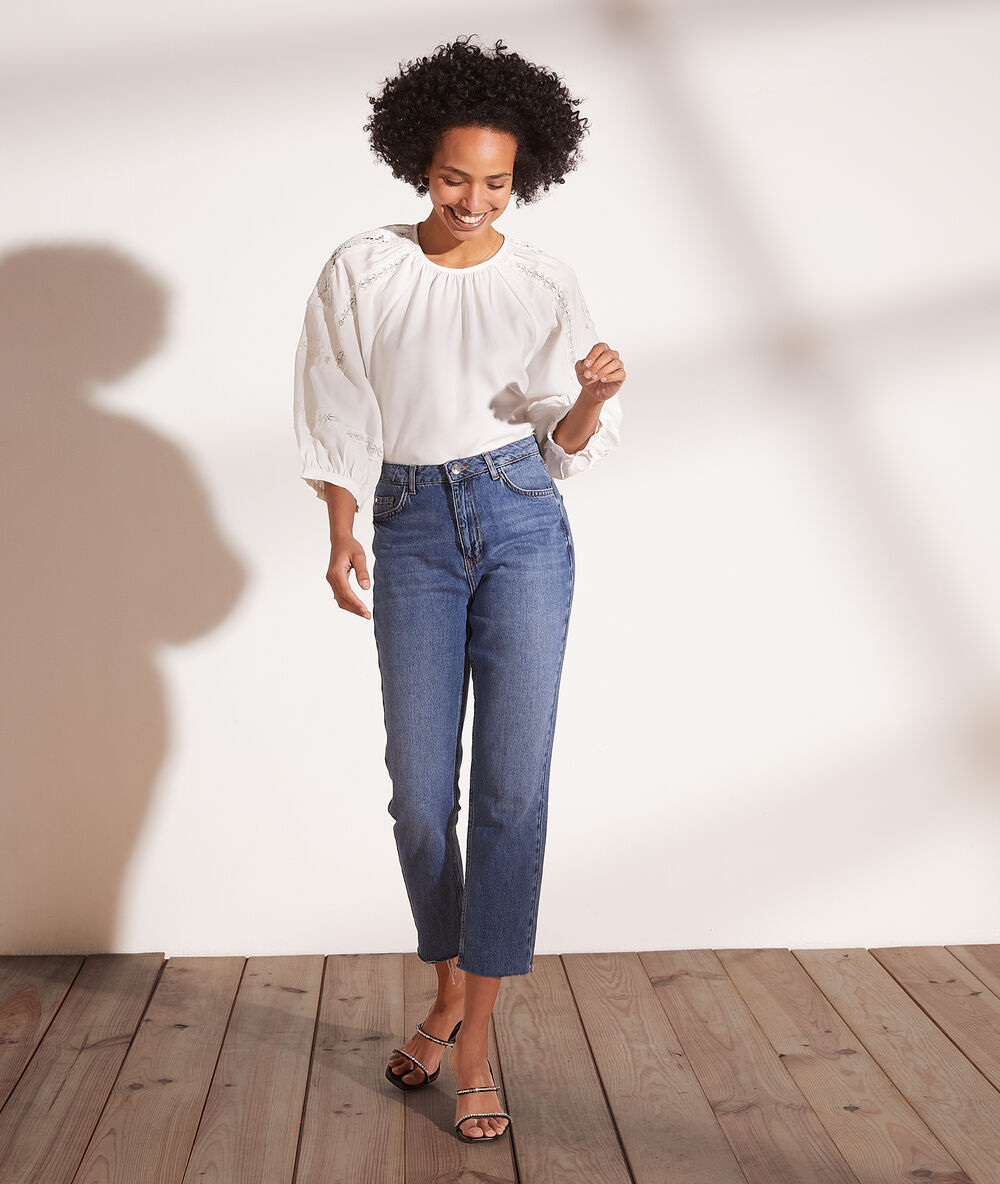 Blouse détails en dentelle blanc.