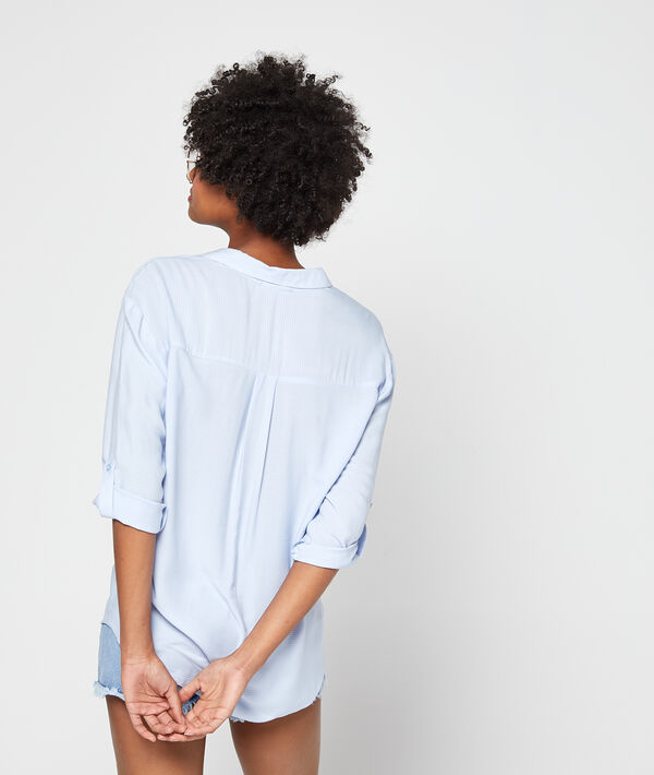 Blouse côtelée à col v ciel.