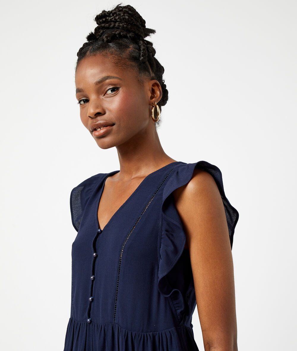 Robe dos noué à volants marine.