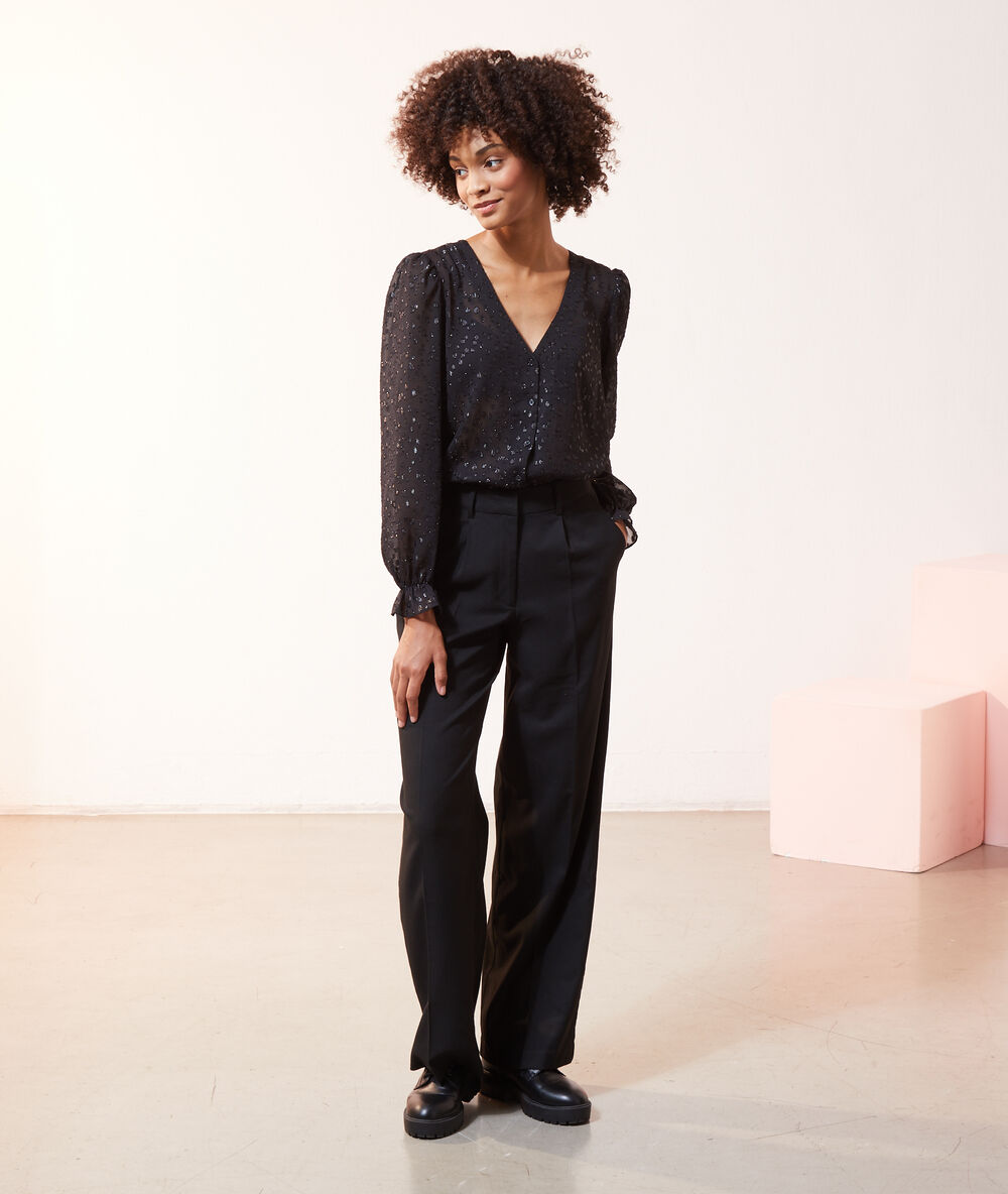 Chemise transparente pailleté manches ballon noir.