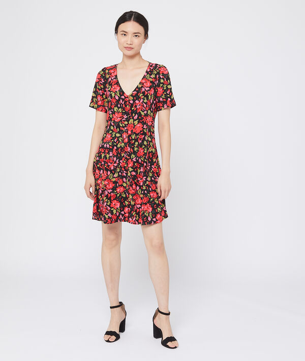 Robe évasée à imprimé fleuri noir.