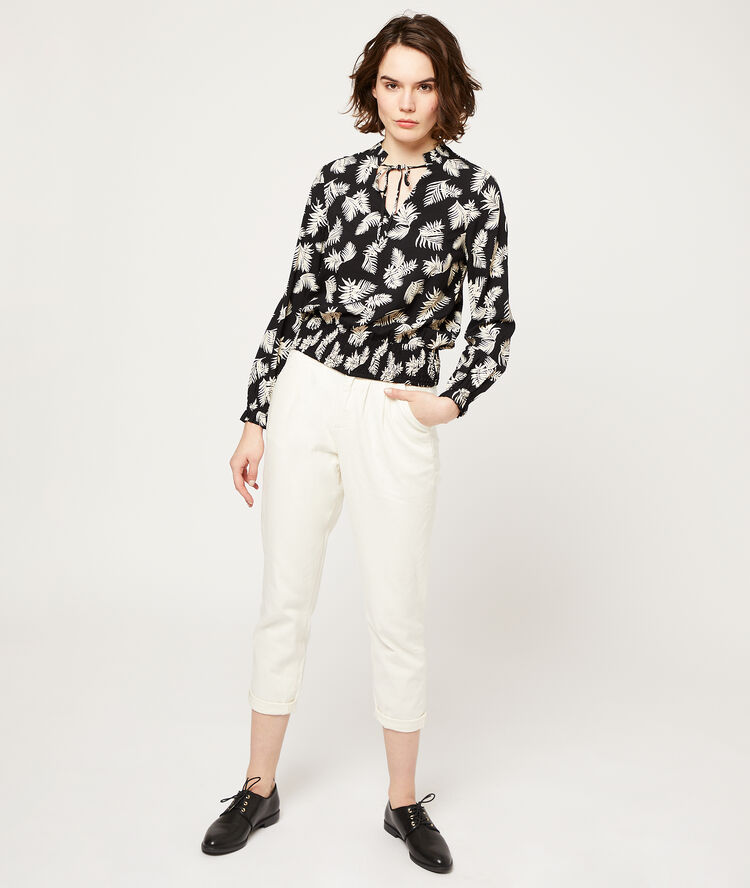 Blouse smockée imprimé feuillage noir.