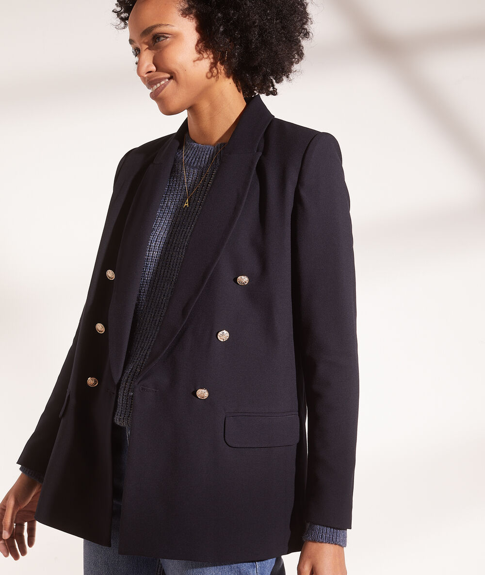 Veste de tailleur bleu marine.