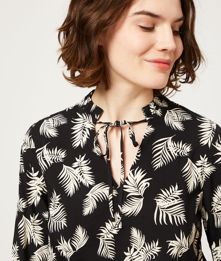 Blouse smockée imprimé feuillage noir.