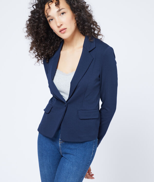 Veste de tailleur marine.