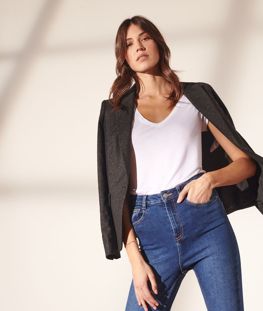 Veste de tailleur pailletée noir.
