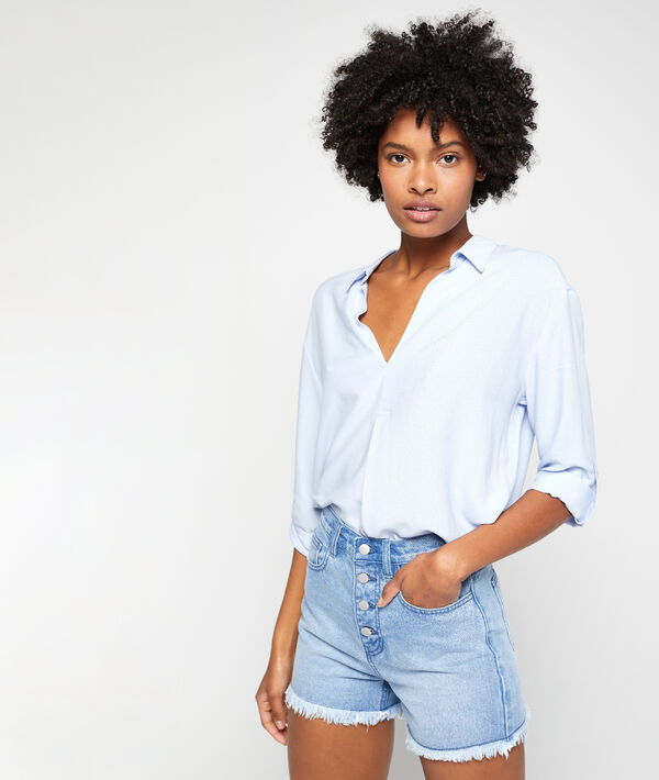 Blouse côtelée à col v ciel.