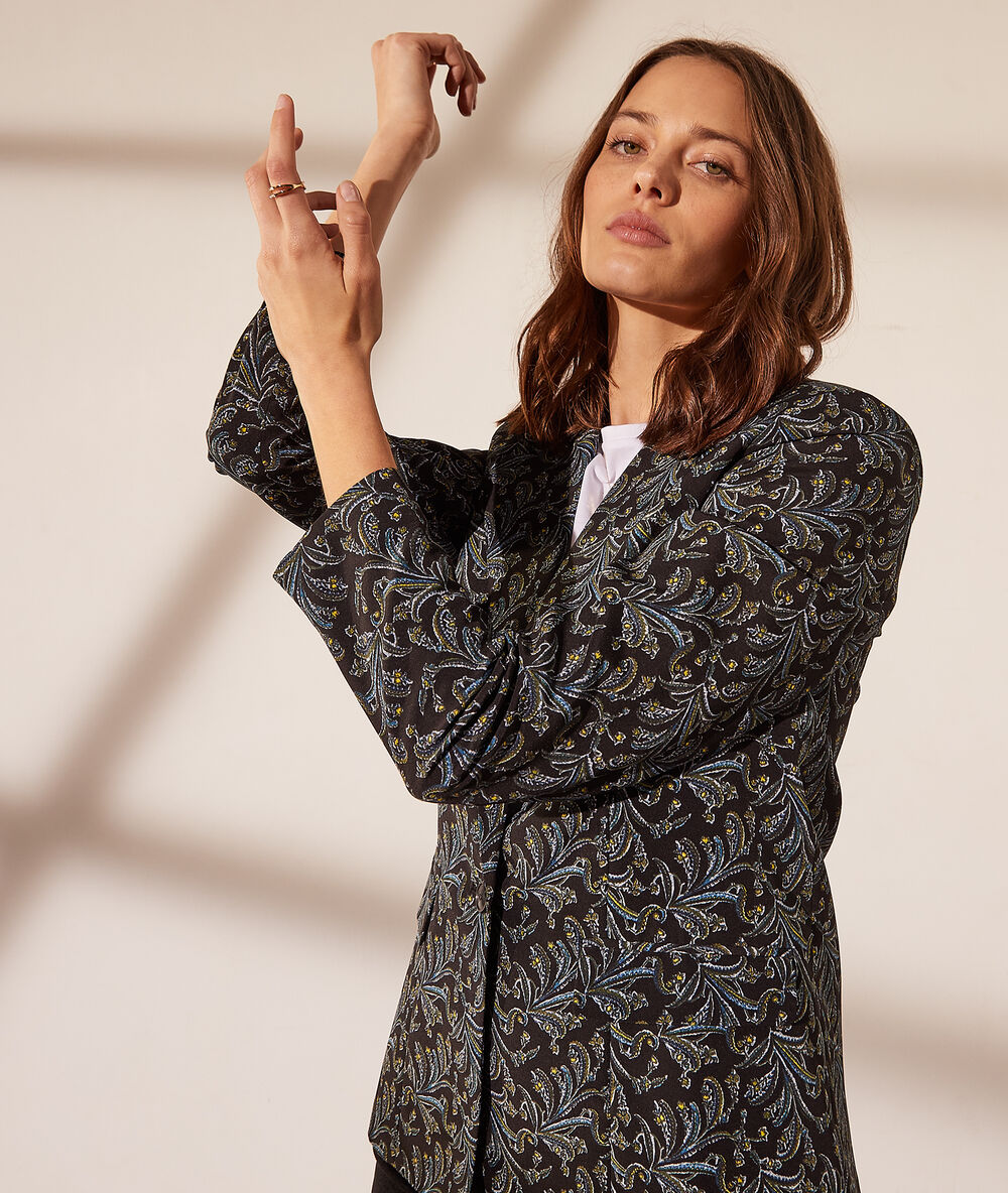 Veste de tailleur imprimé fleuri noir.
