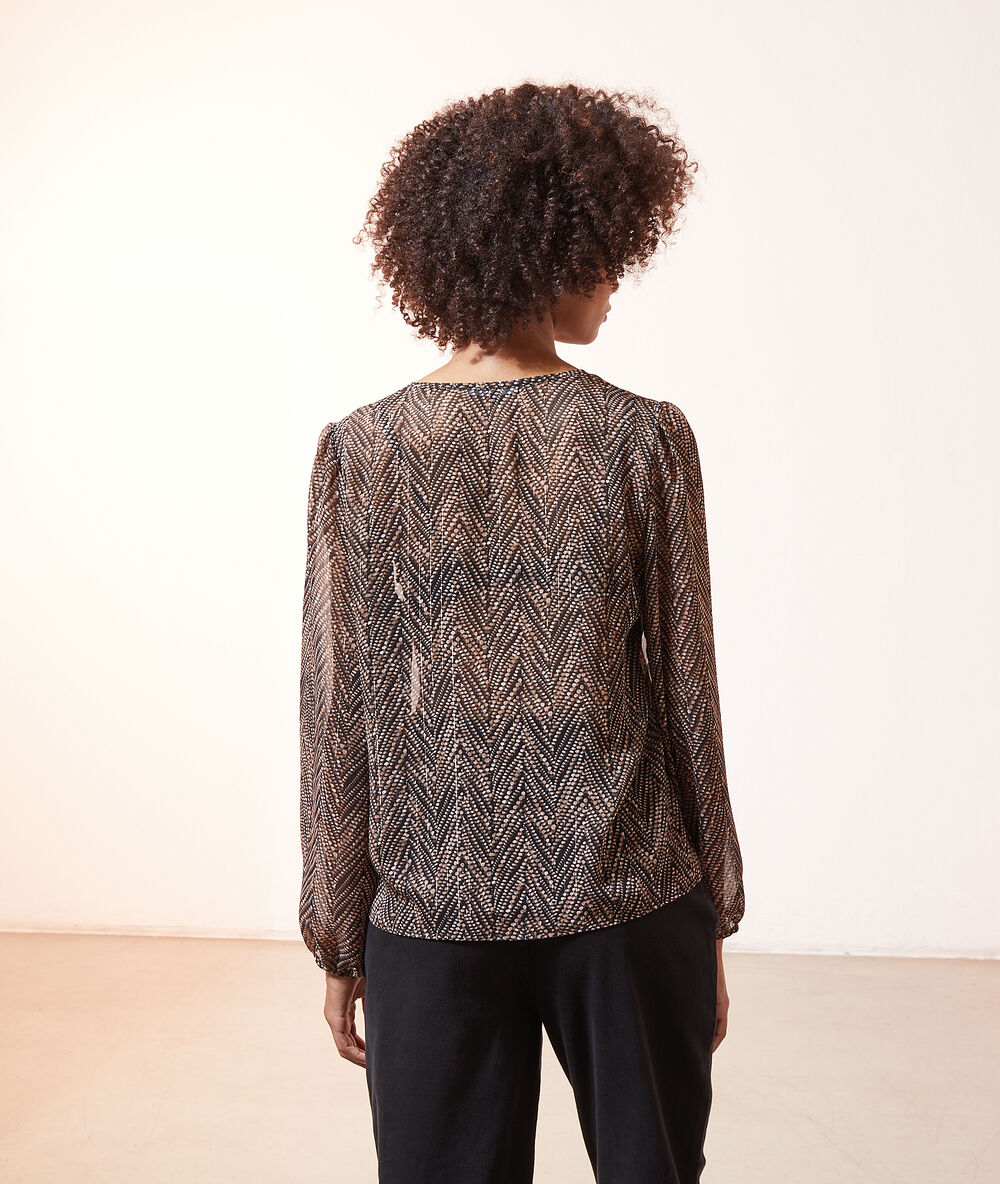 Blouse imprimé géométrique noir.