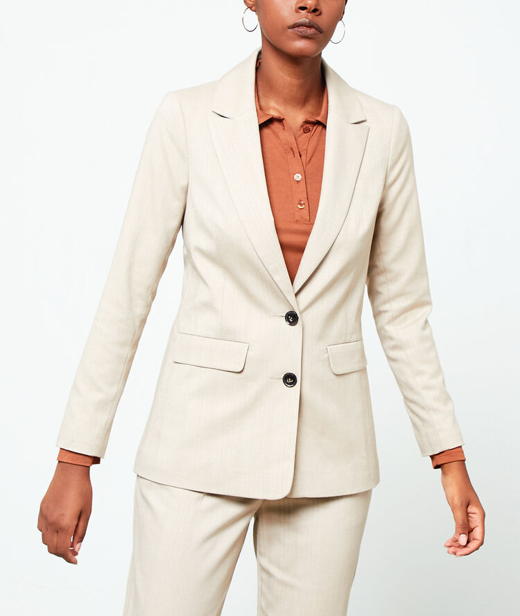 Veste de tailleur creme.