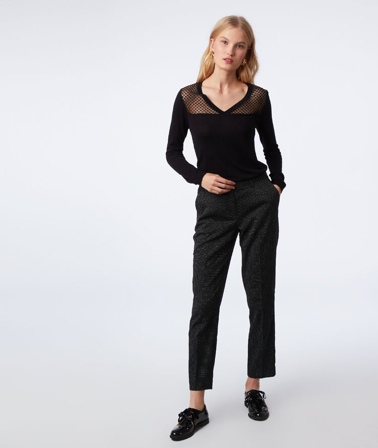 Pantalon cigarette à motifs jacquard noir.